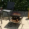 Costway Outdoor Wood Burning Fire Pit Steel Patio Stove W/ Log Storage Rack & Wheels -Costway GUEST 1d0a8812 c21d 4d71 b0b0 2d8087c6e426